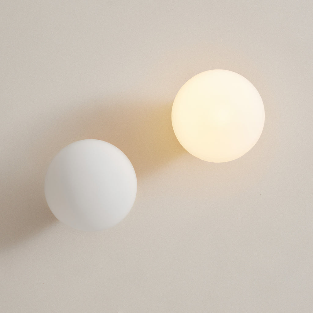 Applique globe strié doré