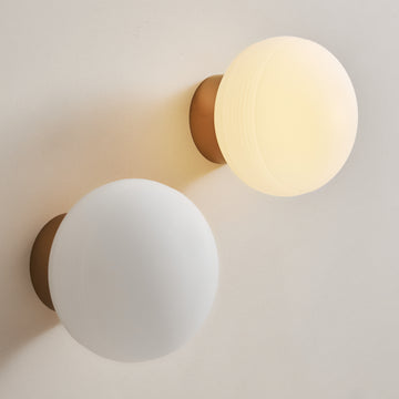 Applique globe strié doré