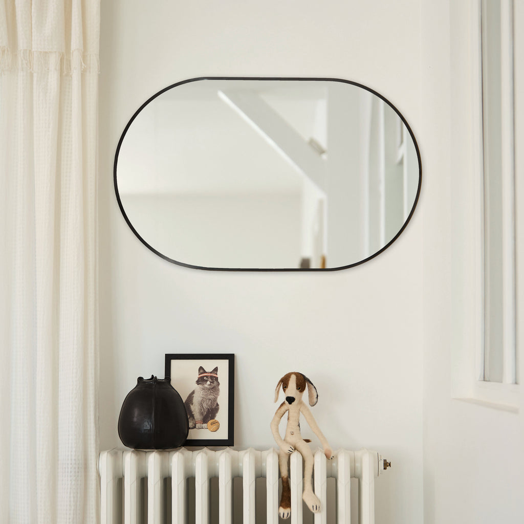Miroir ovale bord noir