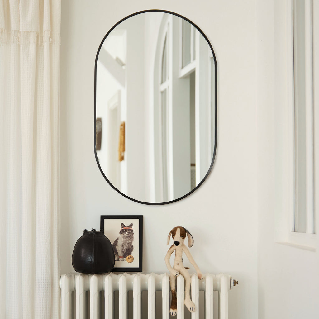 Miroir ovale bord noir
