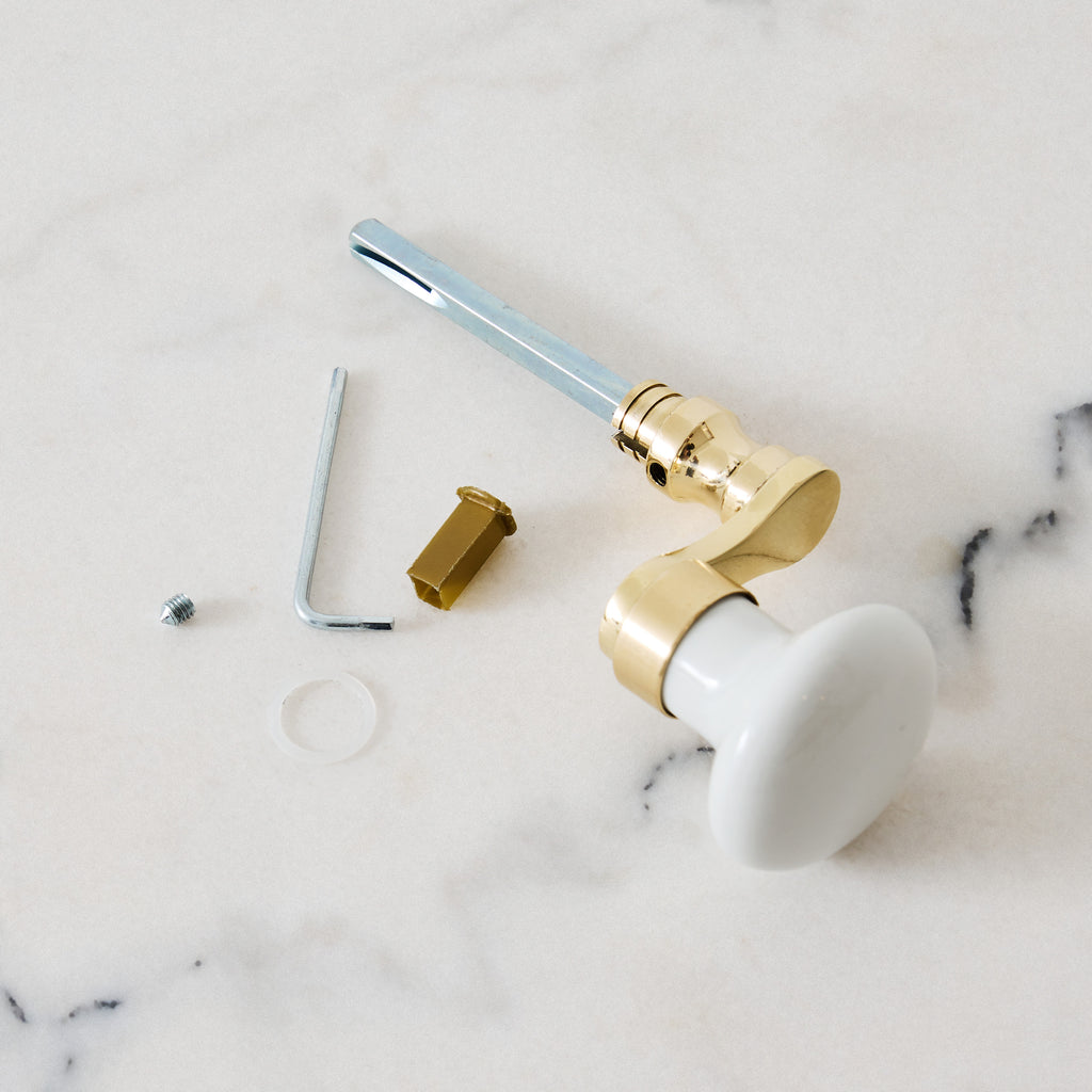 Poignée manivelle bordelaise en porcelaine et laiton poli