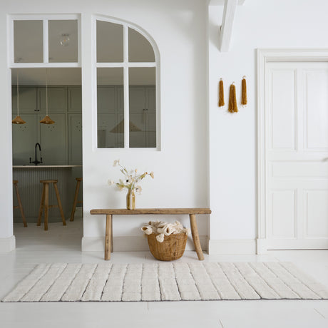 Long tapis en laine à carreaux crème